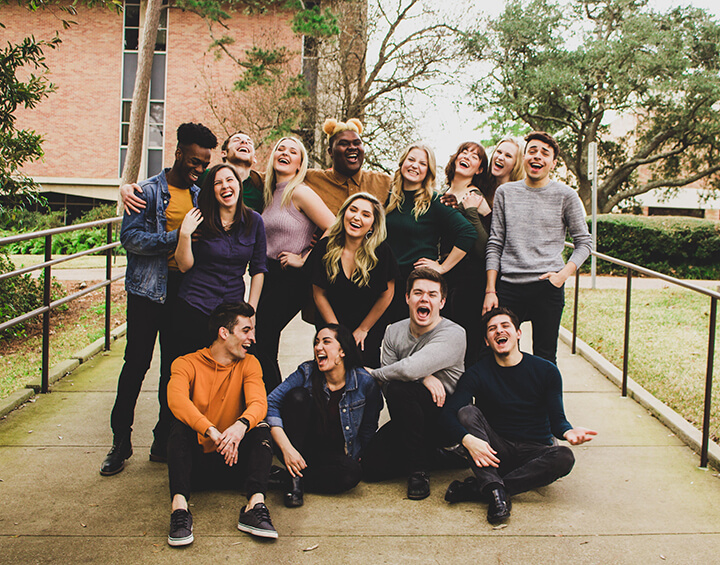 Group photo of the 2019 senior showcase students laughing.